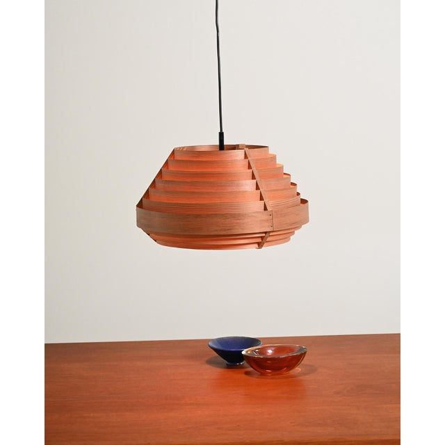 Ceiling lamp with a circular diffuser featuring concentric bands in bent Swedish pine in the style made famous by Hans...