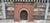 Large Victorian Cast Iron Arched Fireplace with Serpentine Mantel For Sale - Image 13 of 18