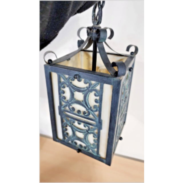 This is an excellent antique slag glass pendant light with 4 panels of caramel slag glass. The lamp has not been tested,...