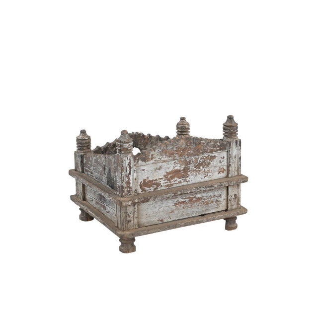 This Vintage Indian Painted Teakwood Small Temple is handcrafted from solid teakwood with layers of beautifully weathered...