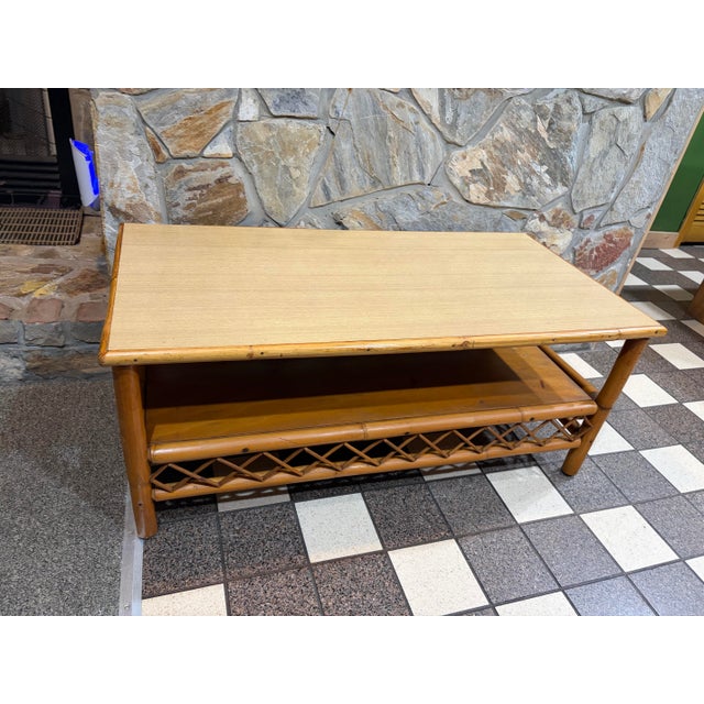 Very good condition Yellow toned bamboo With cross hatch pattern trim around the bottom
