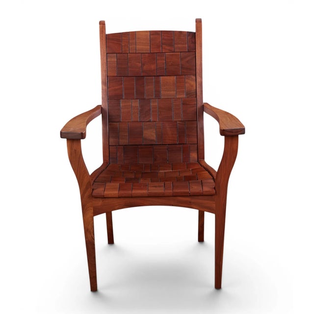 A spectacular designed chair by a remarkable craftsman, Alan Daigre. Made with many individual wood blocks that are...
