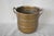 Vintage brass cachepot with leaf handles. This is a pre-owned item so please see all pictures and ask any questions.