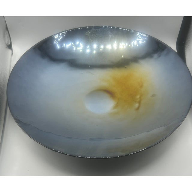 Massive handblown art glass centerpiece bowl by Yalos Casa, Murano. Itsround form features iridescent “oil slick” finish...