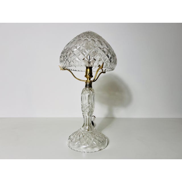 This vintage Art Deco table lamp from the 1940s is a stunning example of the era’s artistic design and craftsmanship. Made...