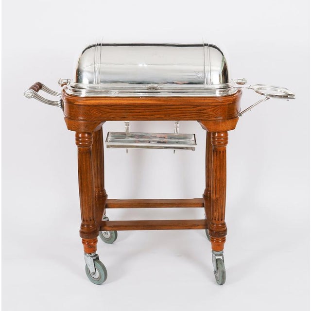 This is a magnificent and rare, Kaymet silver plated serving trolley with revolving dome, dating from the mid 20th...