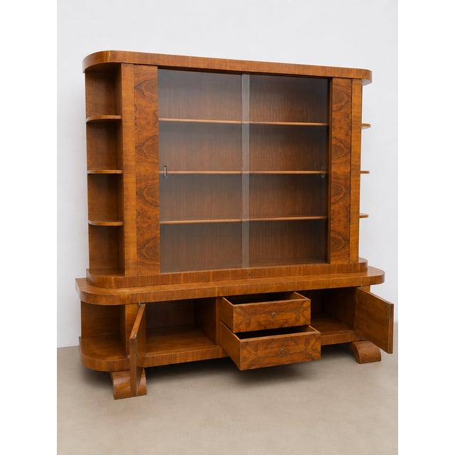Exceptional Austrian Art Deco display and storage cabinet from the 1930s, distinguished by its architectural proportions...