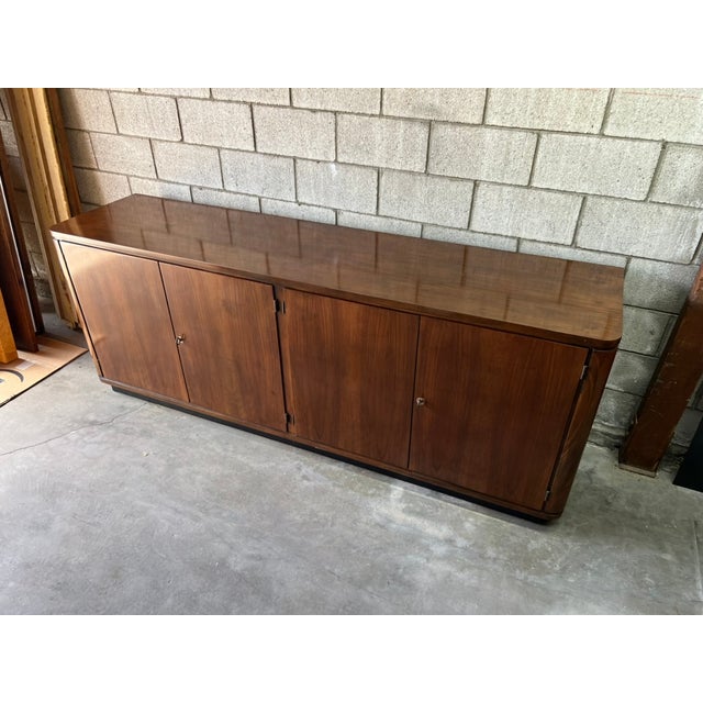 An exceptional European Art Deco credenza showcasing the clean geometry and refined restraint of the Streamline Moderne...