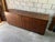 An exceptional European Art Deco credenza showcasing the clean geometry and refined restraint of the Streamline Moderne...