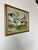 This charming oil on canvas painting, signed by American artist Edward Hergelroth and dated 1948, captures a rustic...