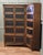 This Oak Bookcase has a slight waterfall shape when fully assembled it fits into a corner in 2 pieces. The sections of the...