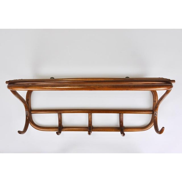 A beautiful, original, and authentic Art Nouveau (Jugendstil / Secession) wall-mounted coat and hat rack, dating from...