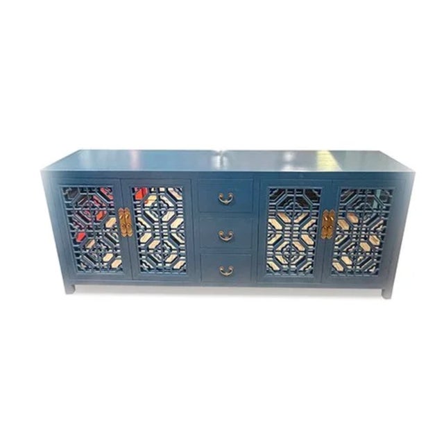 Inspiration Sideboard is made out of Elm wood. It has 3 drawers and 4 doors. Each compartment has 2 removable shelves....
