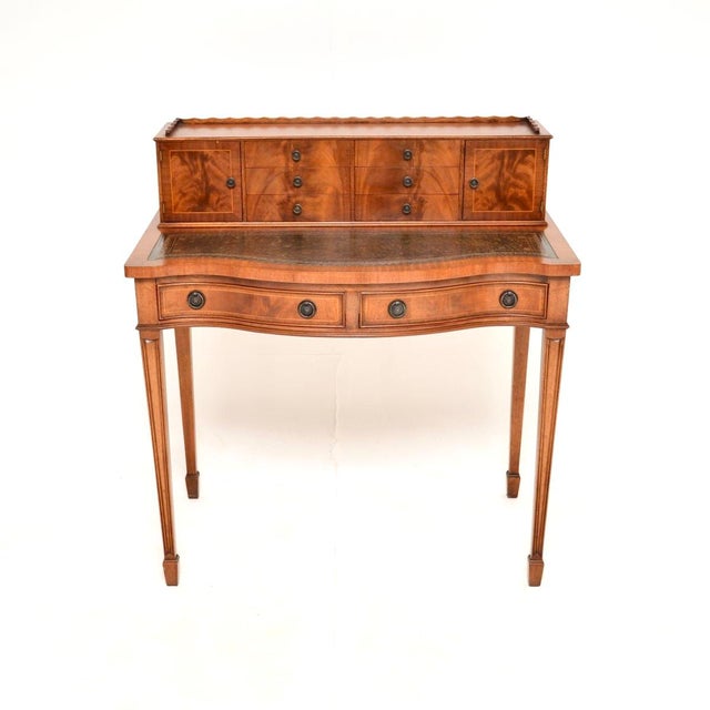 A smart and very well made antique leather top bonheur du jour writing desk. This was made in England, it dates from...
