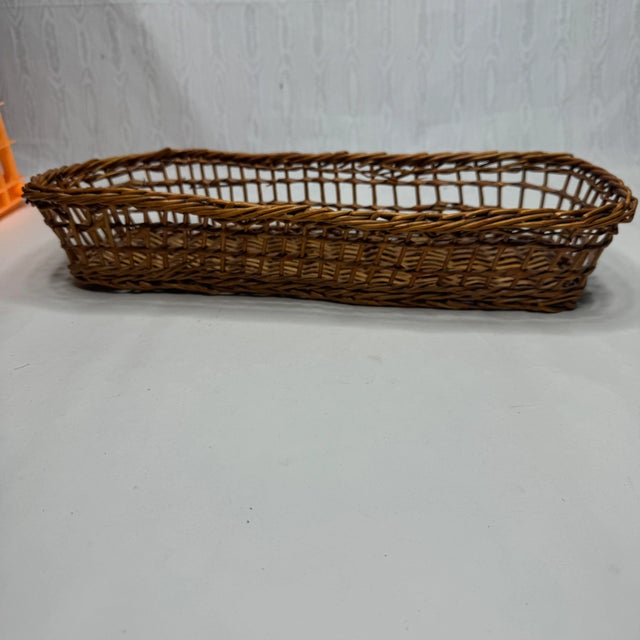 Enhance your home with the timeless charm of this Vintage Wicker French Baguette Basket. Handcrafted from natural wicker,...