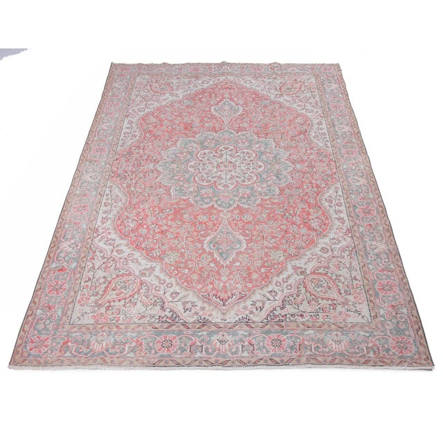 Vintage hand-knotted rug from the Oushak region of Turkey. Approximately 50-60 years old. In very good condition.