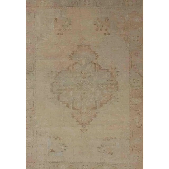 Tribal Vintage Turkish Oushak Rug With Faded Sand Field and Pale Brown Medallion For Sale - Image 3 of 12
