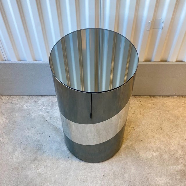 Vintage circa 1970s mirrored column pedestal. Mirrored laminate base with mirror top in graphite and silver mirror finish....
