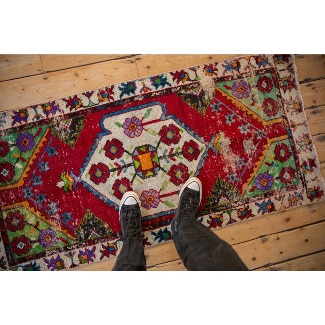 :: Shield-like center medallion with interior pomegranate center blossom bearing germinating flowers stemming therefrom...