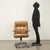 Vintage swivel office chair with castors, steel structure, leather seat and armrests. This piece is attributed to the...