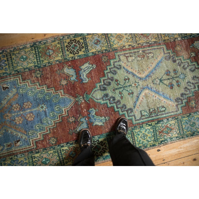 :: Double, oversized stepped center medallions with inward hook and latch design motif and germinating blossoms in...