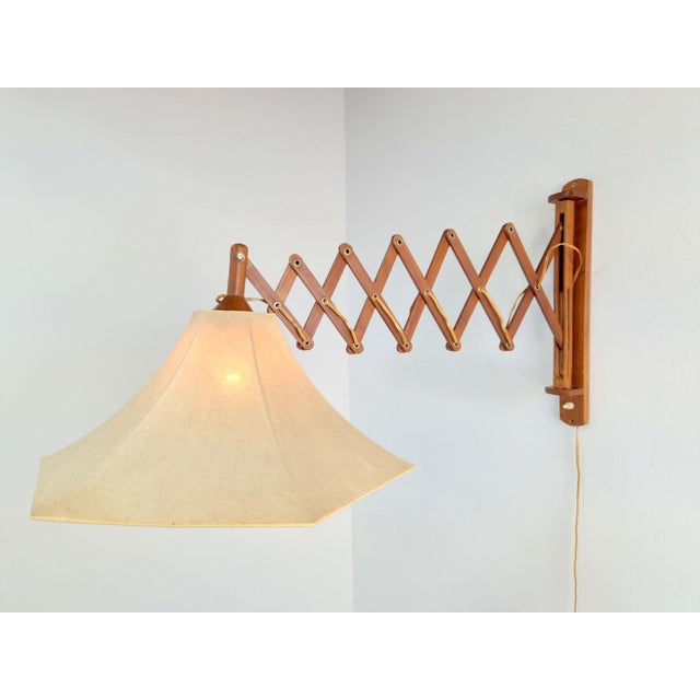Scandinavian Teak Scissors Wall Lamp, 1950s, in Flawless conditions. Designed 1950 to 1959 European Plug (up to 250V).The...
