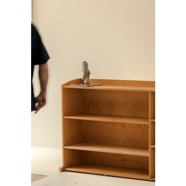 Bookcase produced in the Netherlands around 1970. This cabinet has a plywood beech structure with height-adjustable...
