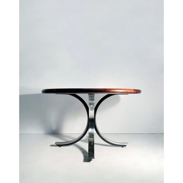 Beautiful high end table produced in the 1970s/1980s attributed to Osvaldo Borsani. The top is easily interchangeable with...