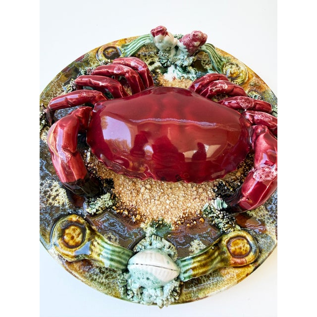 A striking pair of French Palissy majolica crab plates dating to the mid-20th century. Designed as a matching set, the...