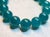 The necklace is 18 inches (45.7 cm) long, and the smooth round beads are 19 mm in size. The beads are a beautiful blue-...
