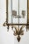 A French gilded bronze antique hall lantern, the brass bulbous candle sconces, surrounded by four sectional circular...