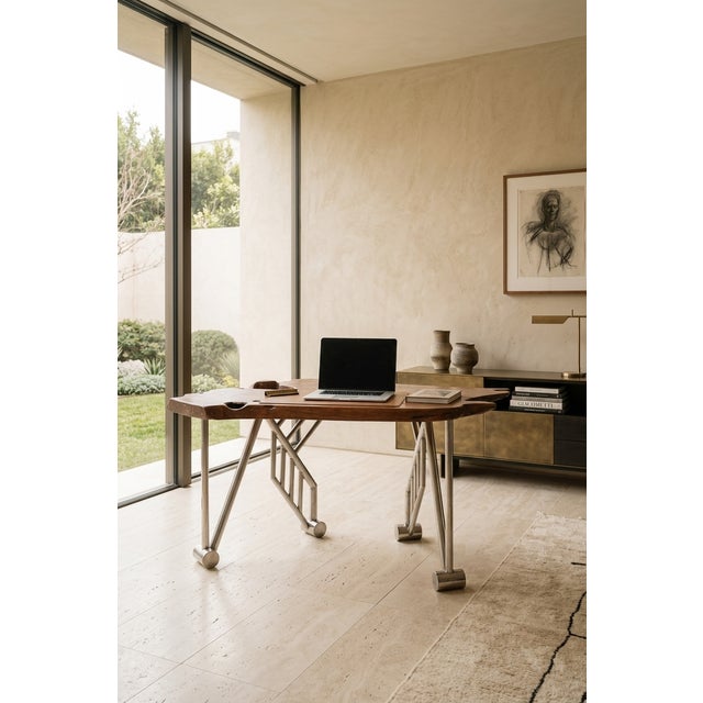 A unique sculptural desk created towards the end of the 20th century, characterized by the striking contrast between a...