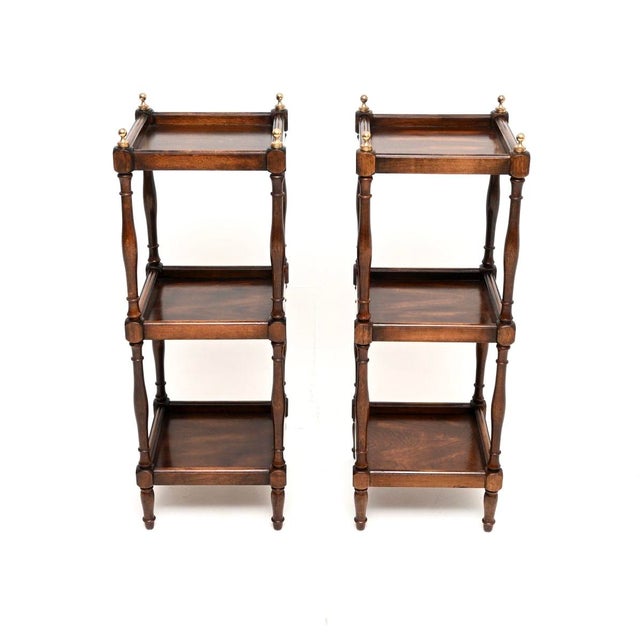 A wonderful pair of antique three tier side tables. They are in the Georgian style, they were made in England and date...