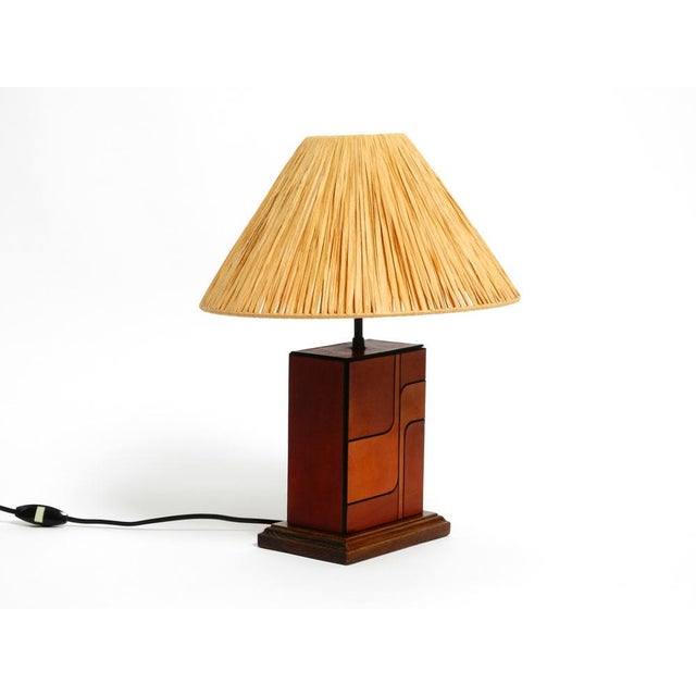 Beautiful 1960s table lamp made of wood and leather. Made in Italy. Great Italian 1960s Pop Art Space Age design. Made...