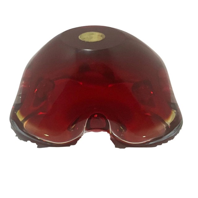 A lovely 19510s hand-blown red cased glass ashtray/catch-all bowl made by the Seguso glass factory on the island of...