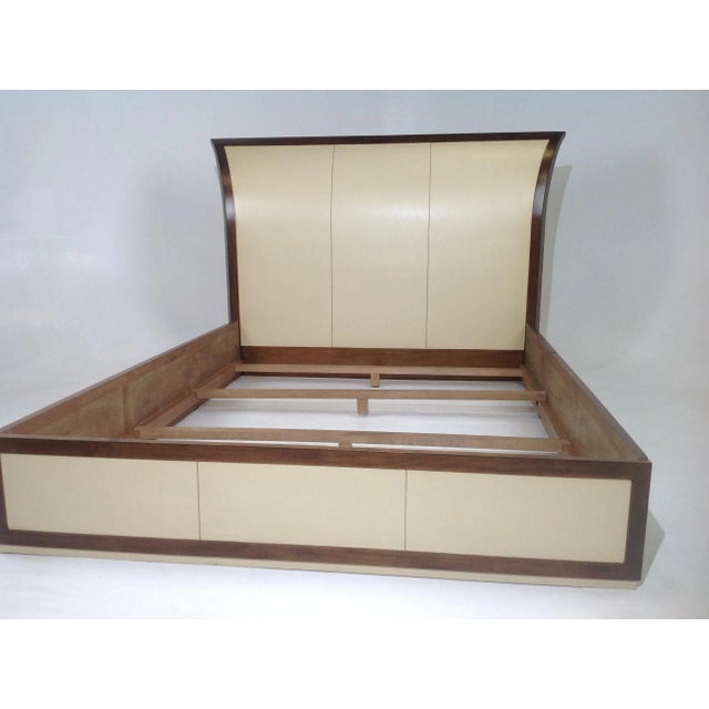 Modern bed sleigh bed with a rich look and unique style. . The frame is made of wood/leather parchment with a rich finish....