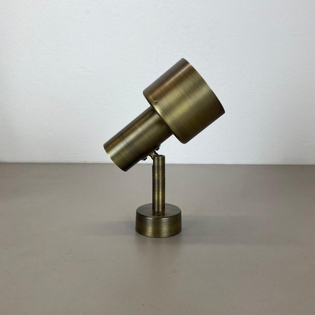 Article: 2 of 4 spot light useable as Wall light and ceiling light made of solid brass Origin: Italy Age: 1970s This set...