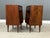 A pair of mid century modern walnut Declaration nightstands with a single drawer designed by Kipp Stewart and Stewart...