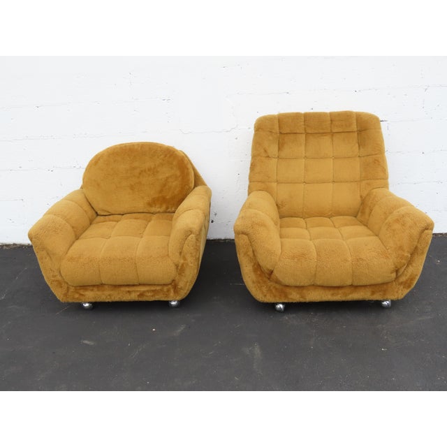 This Pair of Lounge Chairs are made out of wood, and fabric. These chairs have Modern style and design, the his and hers...