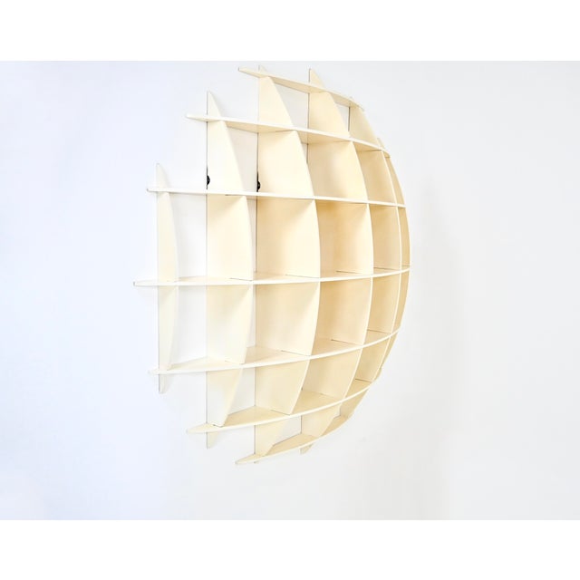 White wooden bookcase by Manfredo Massironi. Model: Tyco. wear due to time and age This piece is attributed to the...