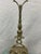 Victorian era tall brass doorstop with handle. Very clean casting of the ornate base featuring roses. The back side has a...