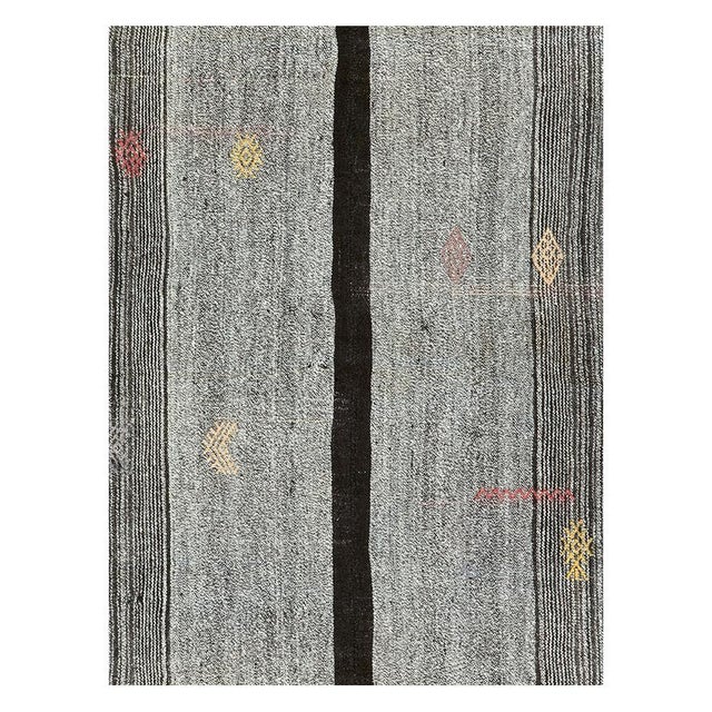 A vintage Turkish flatweave Kilim accent rug handmade during the mid-20th century. Measures: 6' 8" x 8' 8".