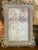 This one-of-a-kind decorative artwork features a custom decoupage paper framed in ornate French Country style. The...