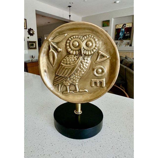 Unique bronze architectural fragment (possibly was door handle) of a the iconic owl symbol associated with Athena, the...