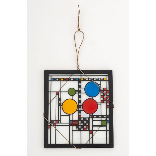 After Frank Lloyd Wright Avery Coonley House Design Glass Panel. Panel: 6.25" H x 5.5" W x 0.25" D. Provenance: The Estate...