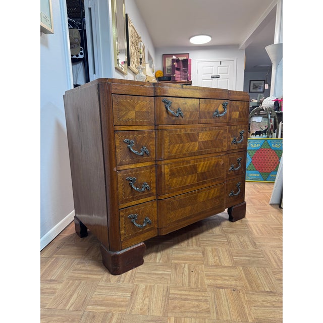 A handsome Continental chest of drawers in the French Provincial tradition, likely originating from the Alsace or Northern...