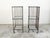 Two vintage industrial carts from the 20th century, with glass shelves and casters, priced and sold $5,400 each. Created...