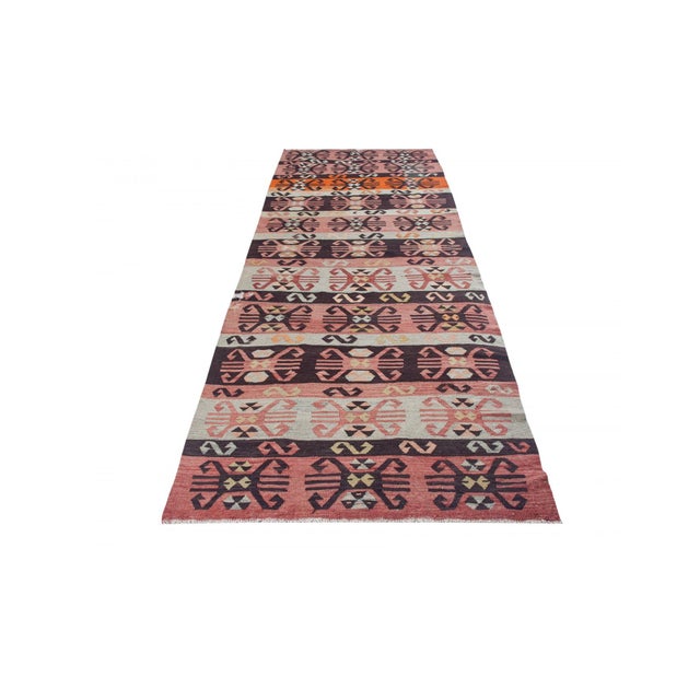 Vintage handwoven decorative kilim rug from Denizli region of Turkey. Approximately 50-60 years old. In very good condition.