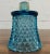 This is a beautiful vintage blue diamond cut swirl glass votive candle holder. Dimensions: - 2.8 in wide - 2.8 in deep -...