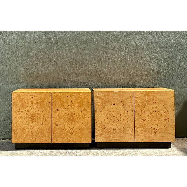 These striking burl wood nightstands embody the glamorous minimalism of the 1970s, echoing the iconic silhouettes...